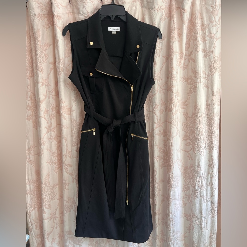 Brand new Calvin Klein Motto Black Sleeveless Dress with Gold Accents. Size 12.
